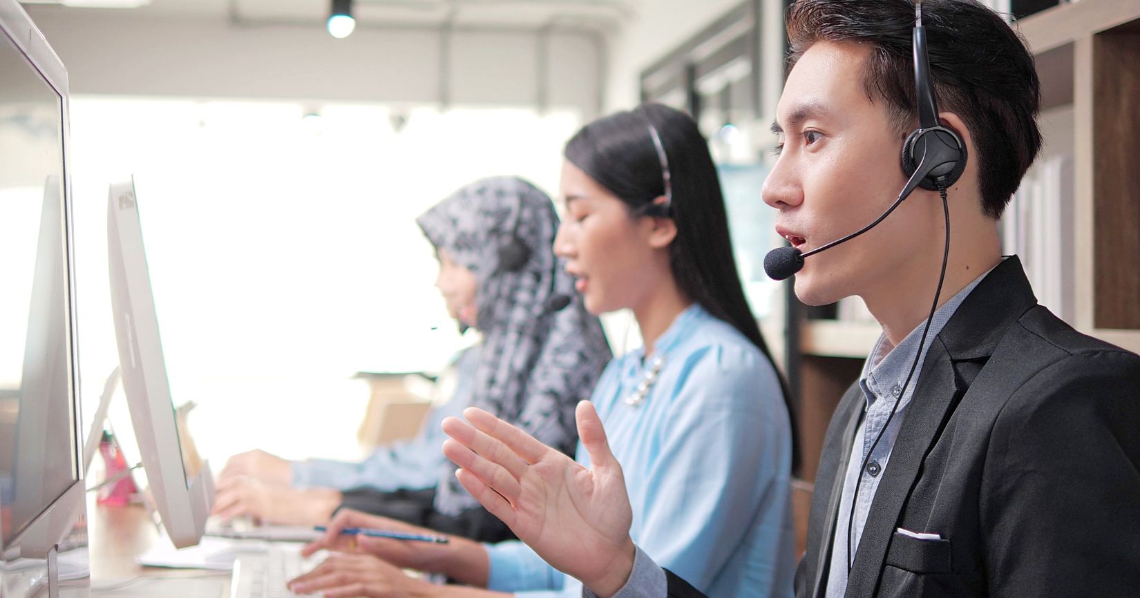 Customer Support In Action: A Team Of Professionals At Work
