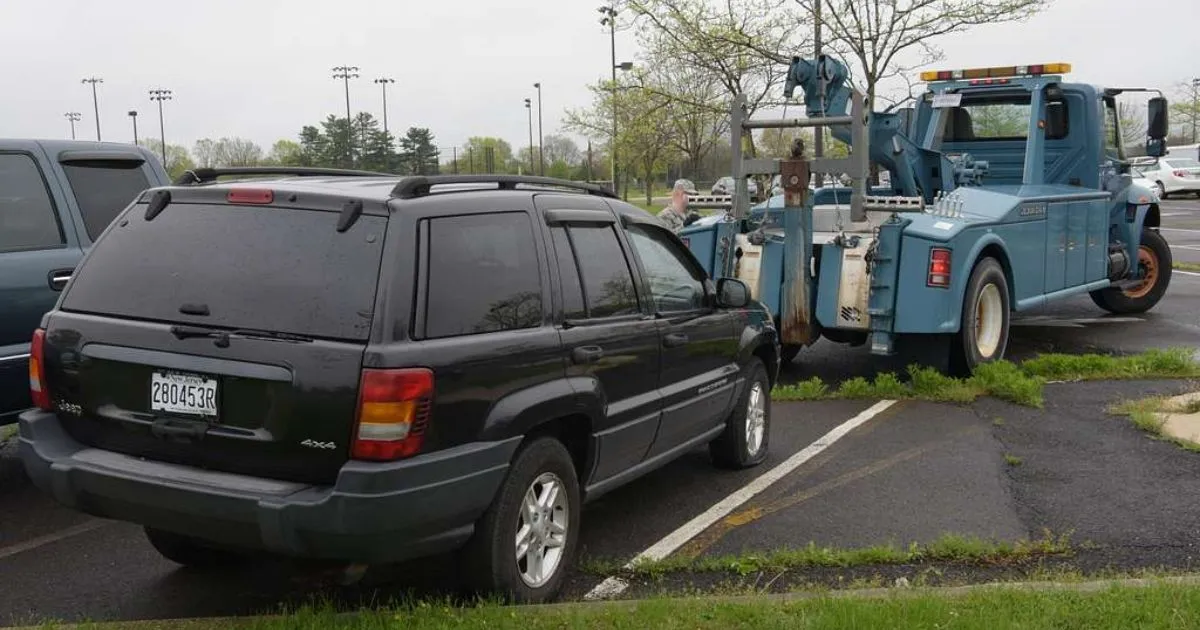 Car being towed due to parking ticket violation