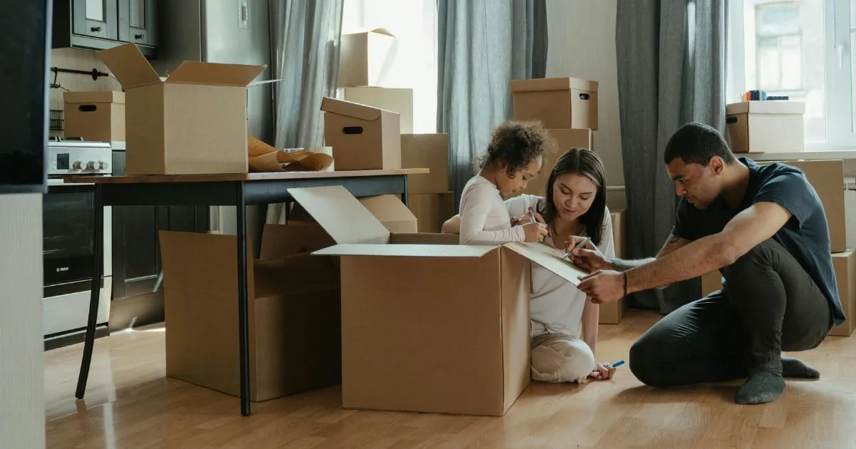A family getting ready to move and packing together